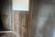 A VENDRE- Villa basse &agrave; terminer &agrave; Lohanosy Ambohijanaka Nord - porte coulissante entre living et la chambre